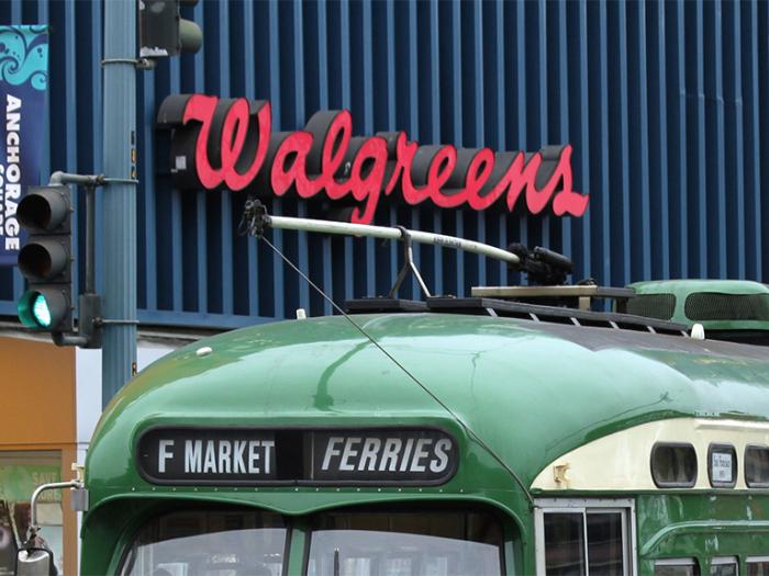 trolley in front of walgreens sign